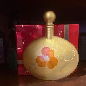 Gold Perfume Bottle with Floral Design